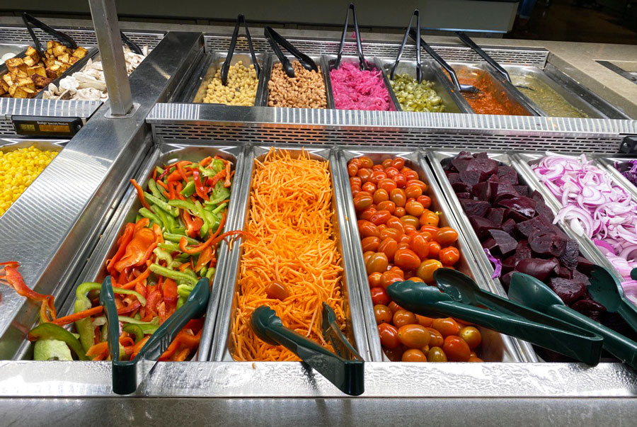 Fresh and Pickled Vegetables in The Whole Foods Hot Bar